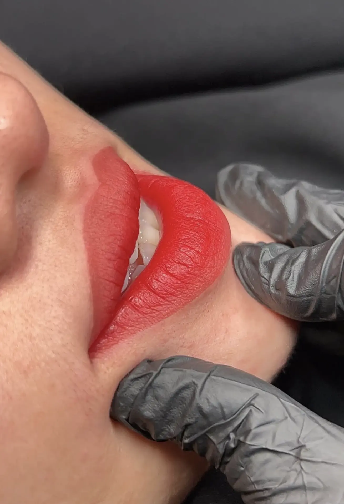 What is someone who does permanent makeup called?